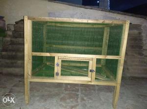 Brown Wooden Frame Green Cage
