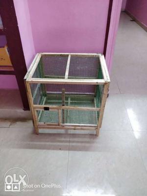 Gray And Green Pet Cage