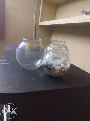 One month used fish bowl with stone's (set of 3)