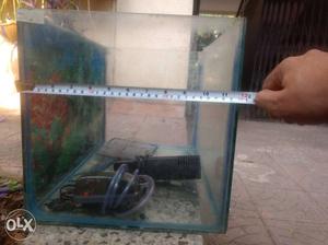 Three Fish tanks (one with top cover/ lid) with