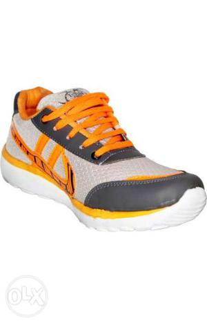 Beautiful Grey and orange sports shoes. Size