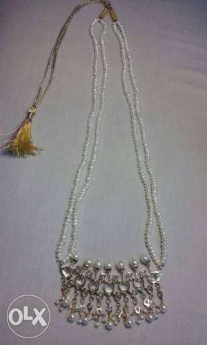 Beautiful tremane with real pearls hurry call