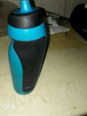 Black And Blue Nike Reusable Water Container