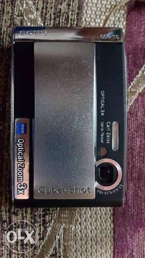 Black Sony Cybershot digital camera. Its in a