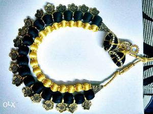Black and golden colour silk thread jewellery