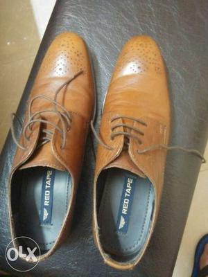 Pair Of Brown Red Tape Leather Dress Shoes
