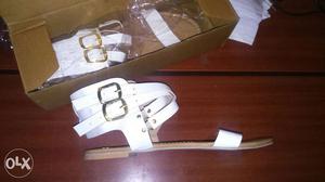 Pair Of White Leather Sandals unused due to small in size