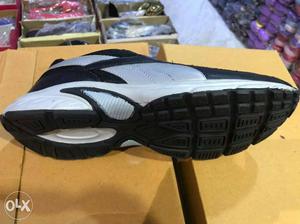 Paired Black And White Basketball Shoe