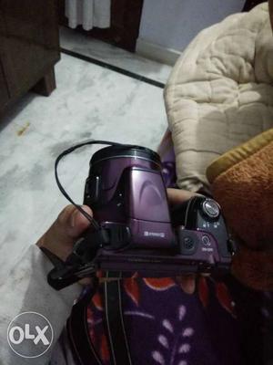 Purple And Black DSLR Camera