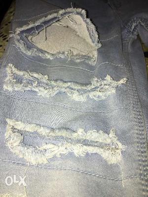 Ripped light blue jeans waist size 30