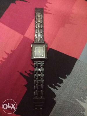 Sonata black wrist chain watch,market price 