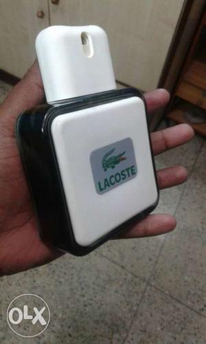 White And Black Lacoste Perfume Bottle