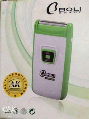 White And Green Boli Cordless Device