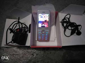 White Intex Candybar Phone With Adapter And Earbuds.32 gb