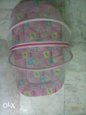 Baby bed with mosquito net