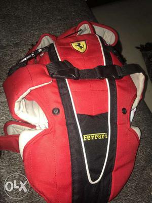 Baby's Black And Red Ferrari Carrier