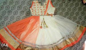 Cream color &orange chudidar new one 4 to 9 years cell