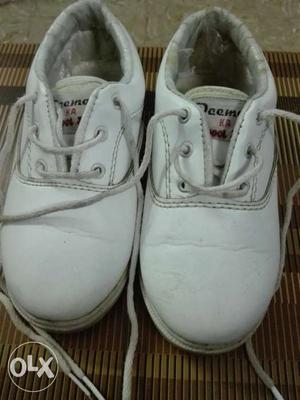 Good condition white colour school shoes for ukg