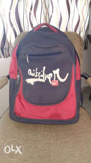 Quicksilver Red and Navy Blue 4 Zipper Backpack