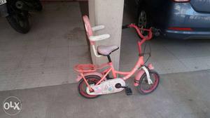 Toddler's Pink And White Bicycle With Training Wheels