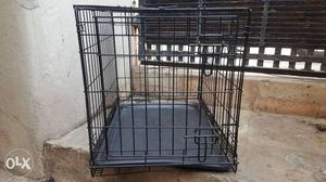 Unused dog cage. dimensions 24x19x18inches L×W×H