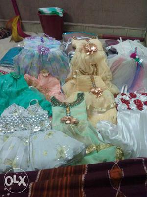 Baby gowns.12 pieces. 500 rs. churidar materials.