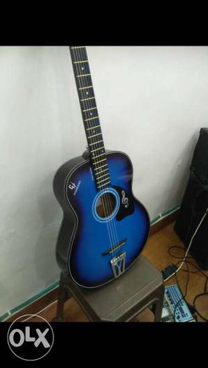 Blue color 6 strings acoustic guitar, amazing