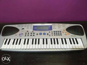 Gray And Black Casio Electronic Keyboard