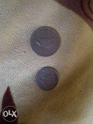 Indian old half rupee and quarter rupee coin of