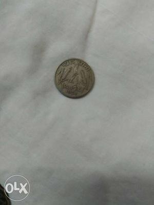 One old quarter silver Anna.
