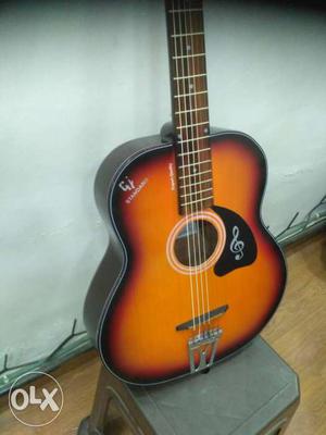 Sunburst acoustic guitar in half price, i am