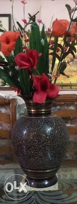 A beautiful Minikari vase available for sale.