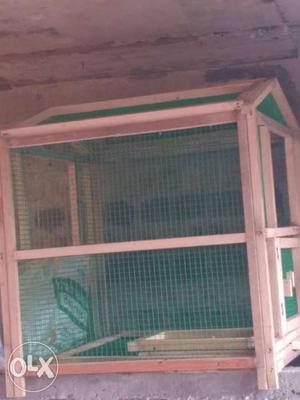 Brown Wooden And Green Cage