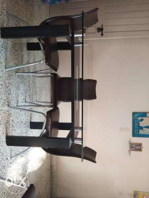 Dinning table with 4 chairs. length approx 4.2