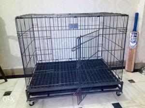 Dog Cage. Sparingly used. Height and Length 3 ft