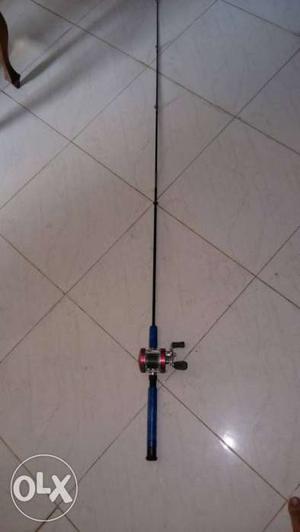 Fishing multiplier reel and rod with extra line