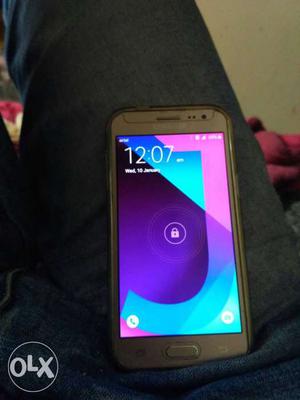 Galaxy J2 with bill box charger headphones used
