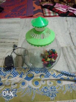 It is a aquarium bowl with airmotor,cover,pipe