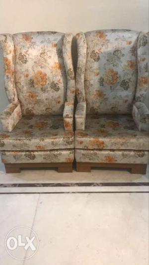 Two White-and-multicolored Floral Fabric Sofa Chairs