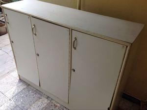 White wooden cupboards