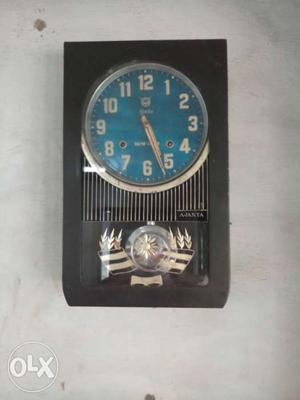 Black And Blue Pendulum Clock