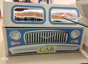 Brand new kids Car shaped bed with storage.