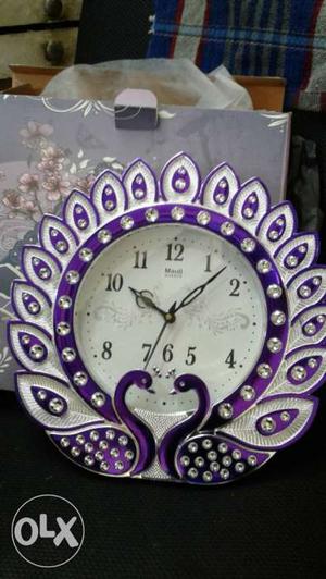 Round White And Purple Swan Themed Clock