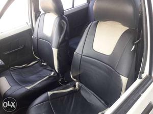 Two Black Leather Car Seats