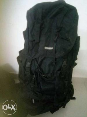 Black color traveling sack bag, with water and