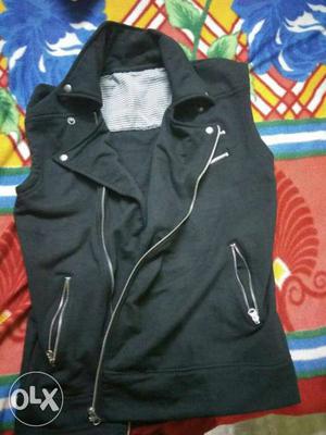 Cut sleeve black warm jacket only once used,