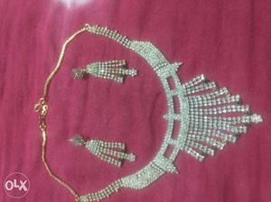 Gold-colored Bib Necklace And Earrings Set