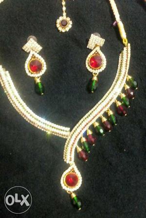 Gold-colored Red And Green Stone Encrusted Necklace And