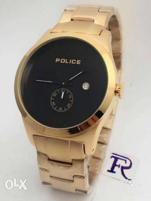 Gold with black dail watch