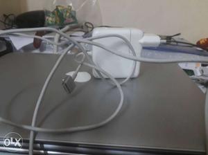 MacBook Pro With White Apple Magsafe Charger